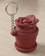 Rose Clicker Keychain on a silver chain keyring