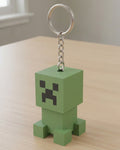 Creeper Clicker Keychain on a silver chain keyring