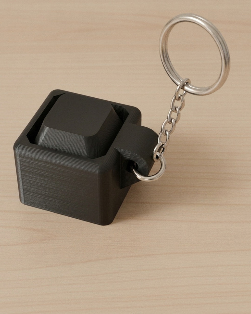 Mini Key Clicker Keychain on a silver chain keyring