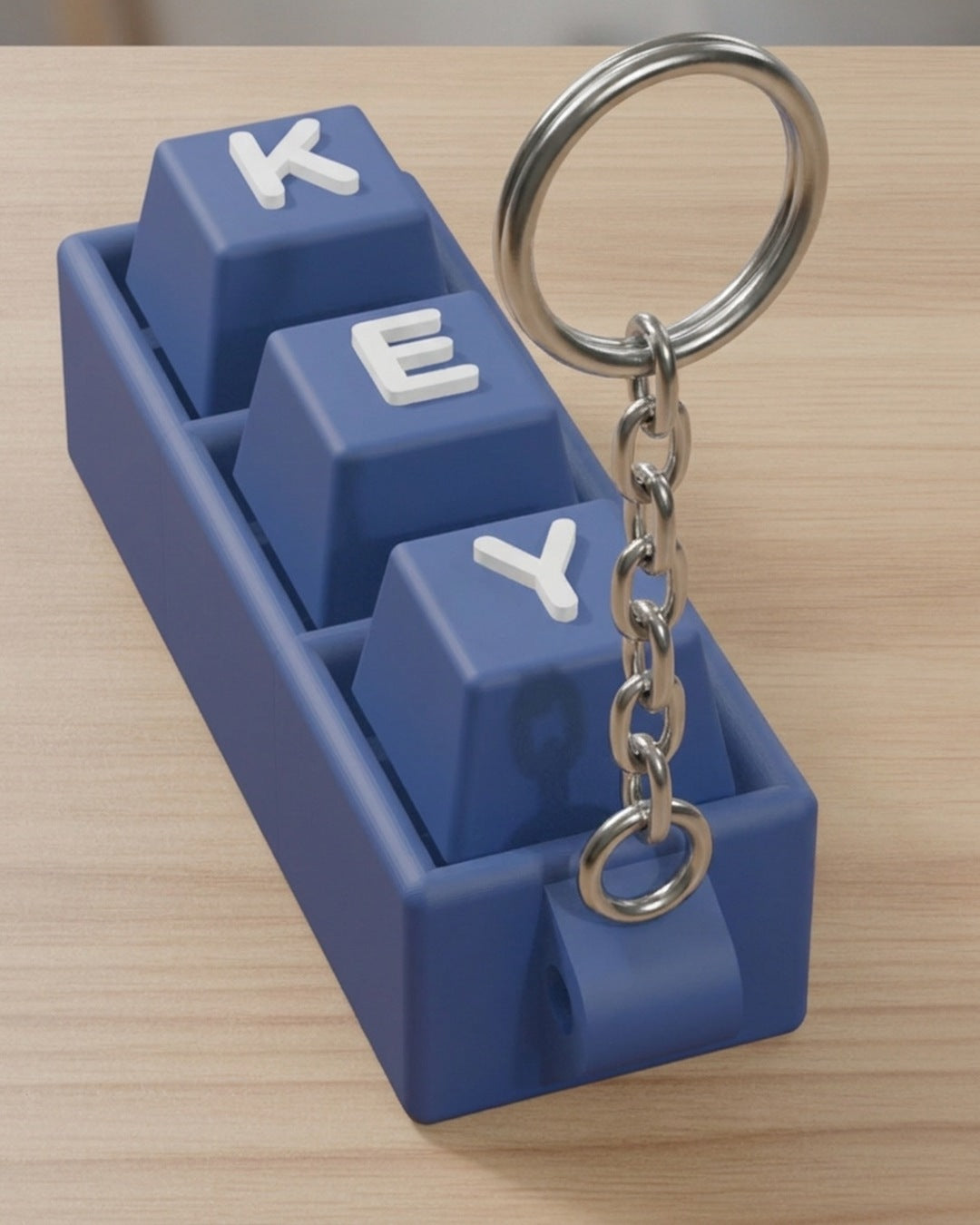 Letter Keycap Clicker Keychain on a silver chain keyring