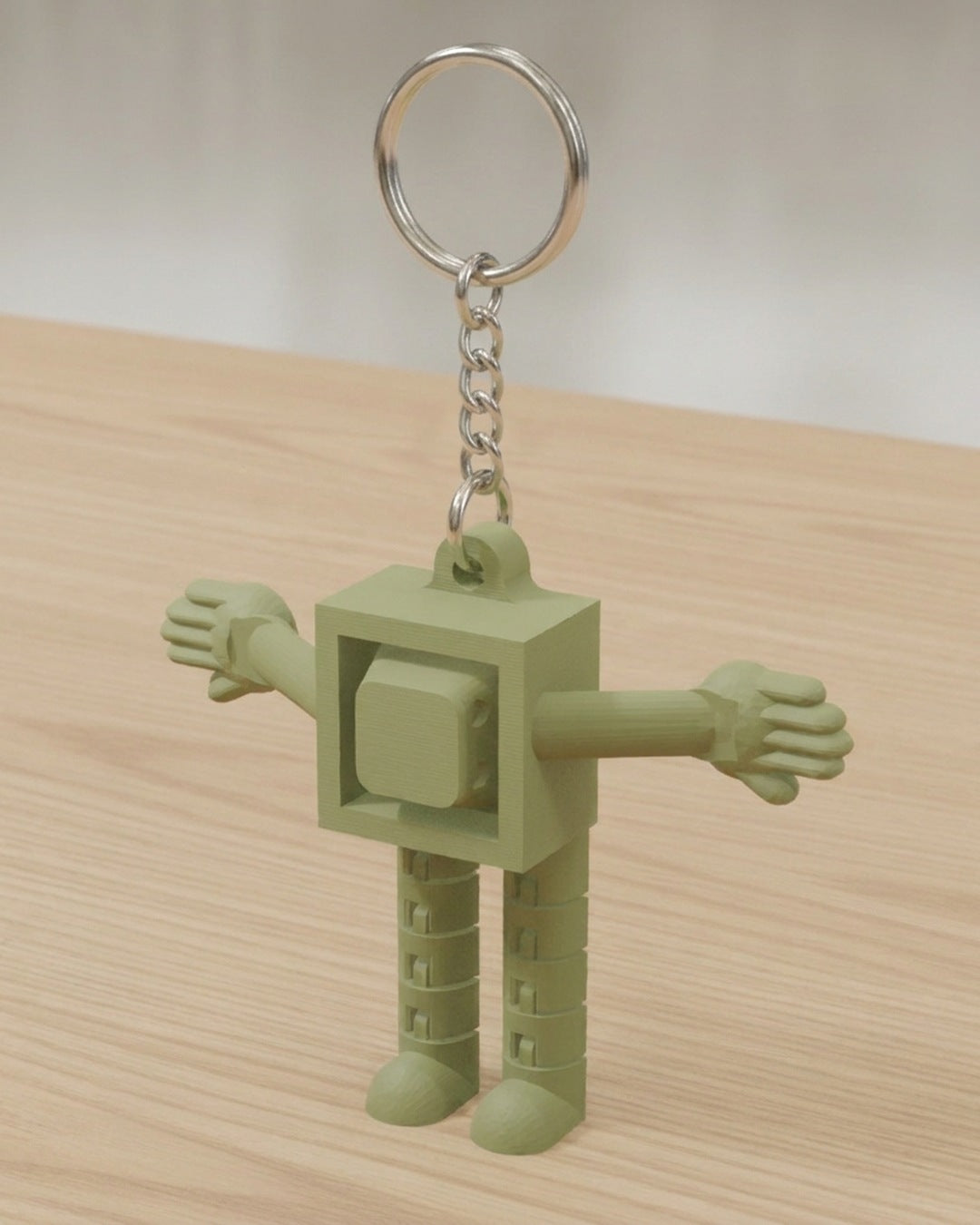 Clicker Buddy Keychain on a silver chain keyring