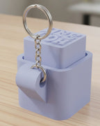 Cube Keycap Clicker Keychain on a silver chain keyring