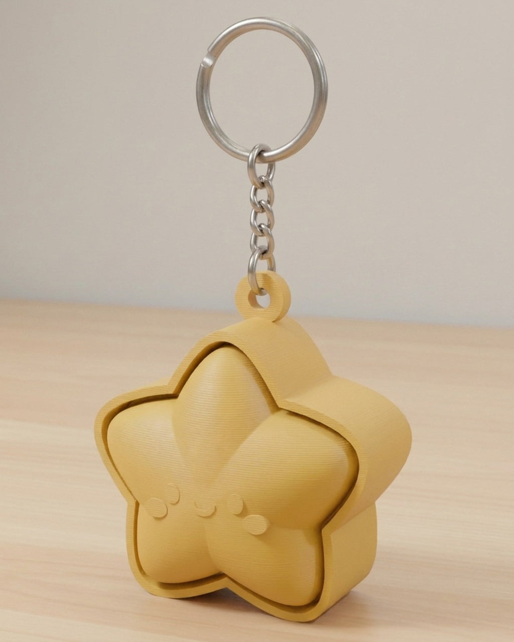 Star Face Clicker Keychain on a silver chain keyring