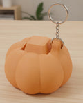 Pumpkin Clicker Keychain on a silver chain keyring