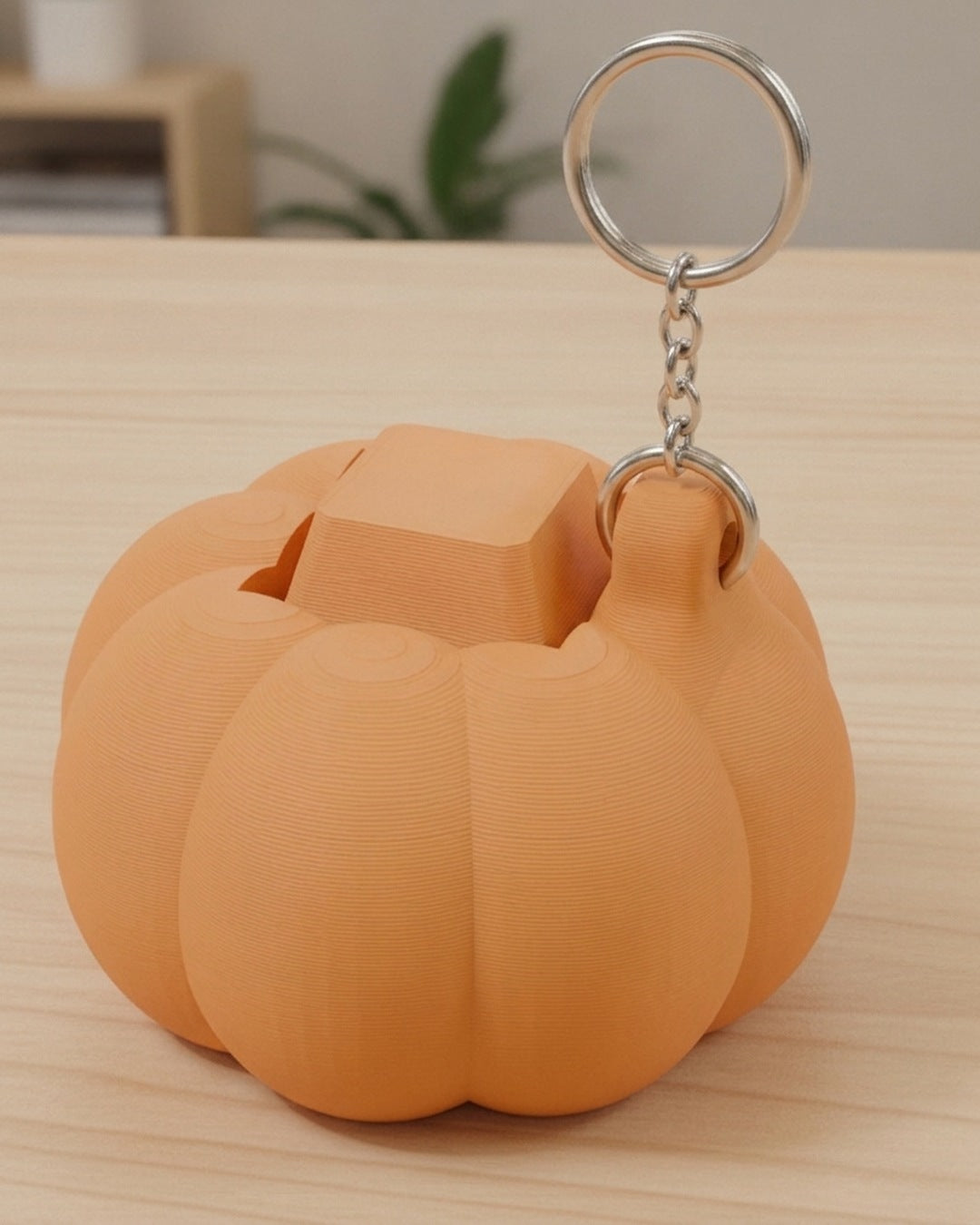 Pumpkin Clicker Keychain on a silver chain keyring